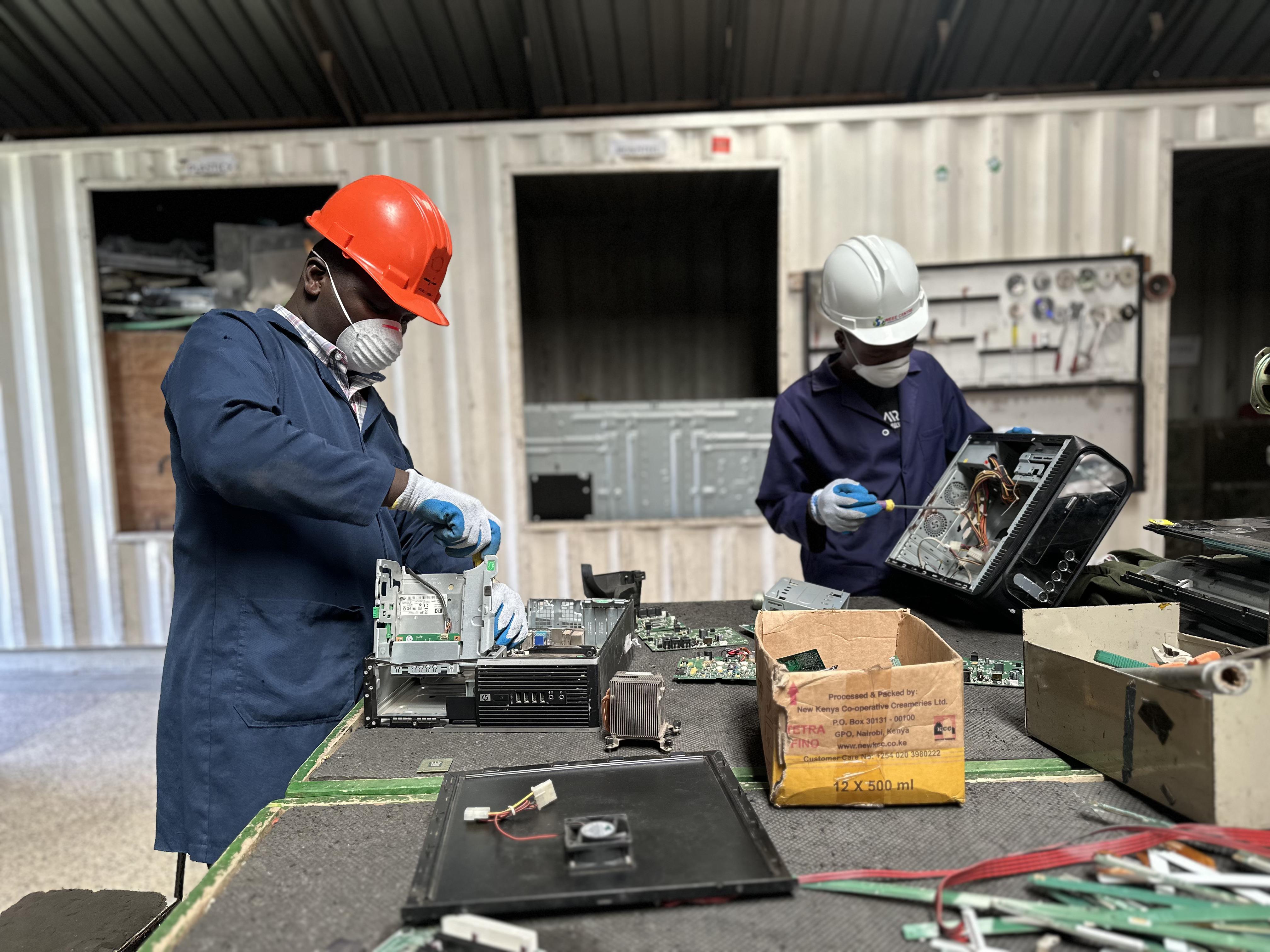 Technician refurbishing a laptop